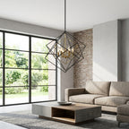 Modern geometric cube pendant light fixture with black outer frame and gold inner accent.